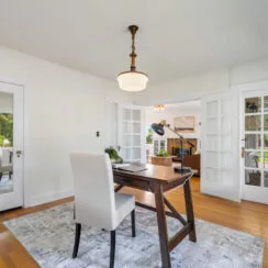 Downstairs bedroom, which is staged as a home office.