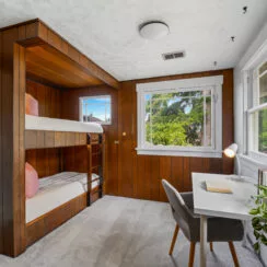 One of two guest bedrooms. Newer features and restored woodwork.