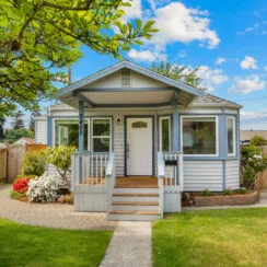 A front-facing photo of the exterior of 2402 N Stevens St, a craftsman home in North Tacoma.