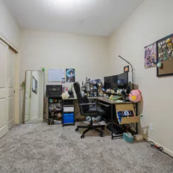 Secondary bedroom, currently in use as a home office.
