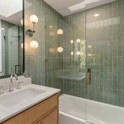 Hallway bathroom. High-end materials are visible.