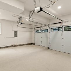 Interior of garage, with two bays visible.